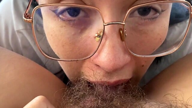 Lesbian sucking a sweet hairy bush