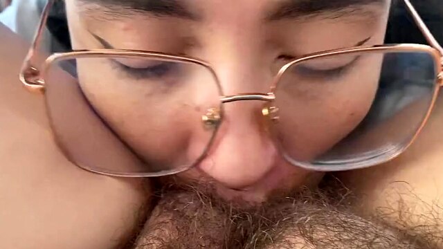 Lesbian sucking a sweet hairy bush