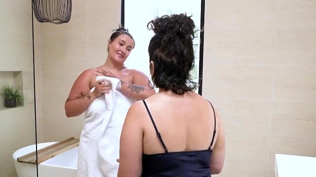 Busty Lesbians Lick and Finger Each Other in the Shower