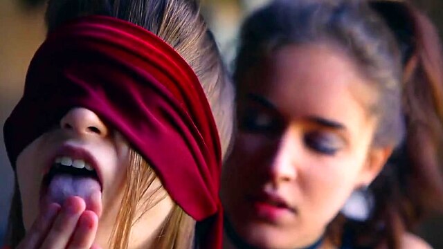 Straight girl is blindfolded by lesbian before she orgasms