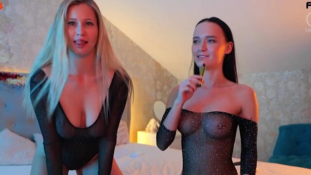 Sasha Sparrow and Stella Cardo lick each other's pierced breasts in bodysuit, Lesbian Show