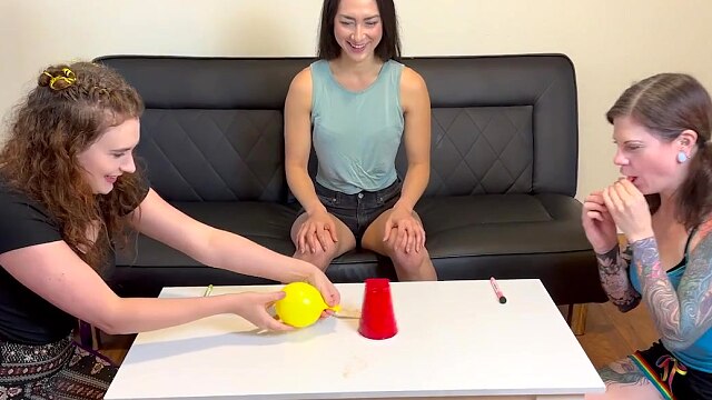 A naughty strip game ends in a wild lesbian sex toy session