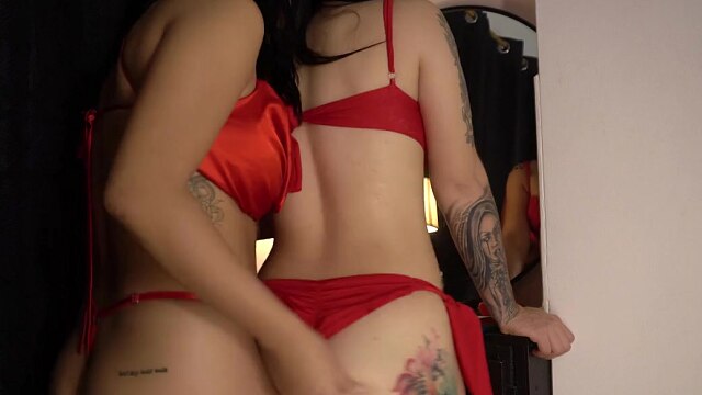 Lesbians in Red Lingerie Making Love
