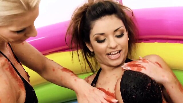 Two sexy lesbians are rolling in the mud pool and having some soft BDSM action